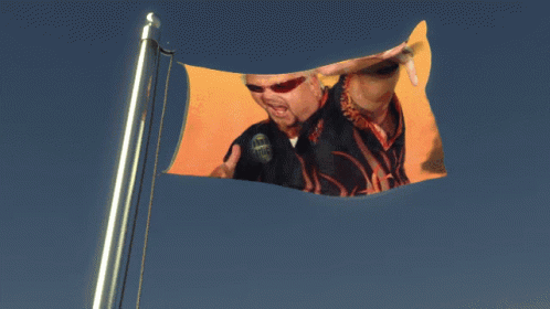 Guy Fieri In A Raising Flag GIF