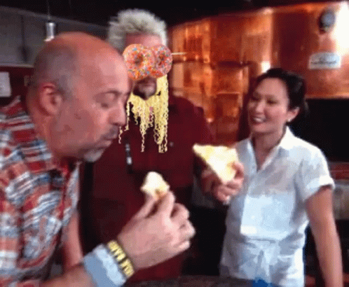 Guy Fieri With A Donut And A Pasta On His Face GIF