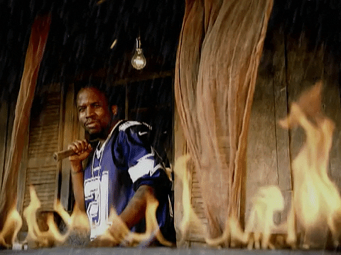 Guy Fighting With Fire GIF