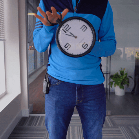 Guy Holding Clock Countdown GIF