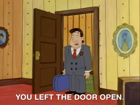 Guy In Suit There Spare Room Door Opening GIF