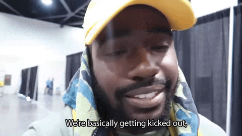 Guy In Yellow Hat Kicked Out In Nice Way GIF