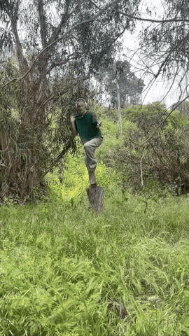 Guy Listening To Music Dancing Outside GIF