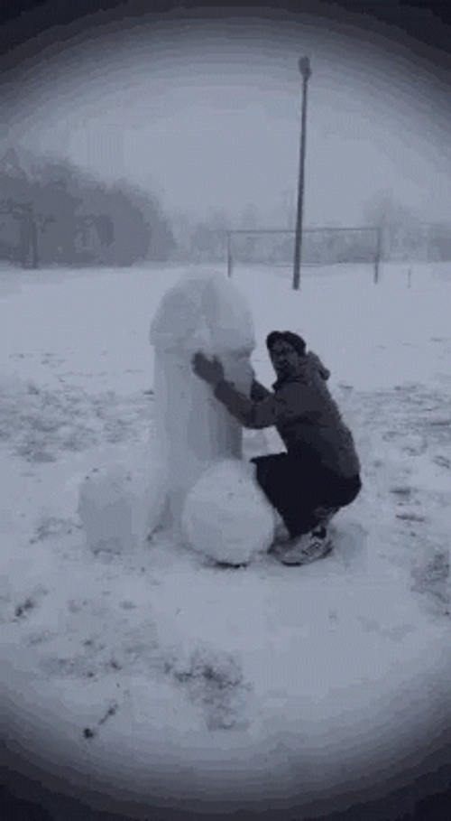 Guy Making Snowman Into Funny One GIF