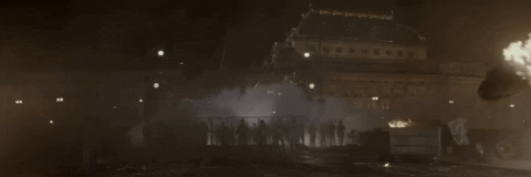 Guy On Fire Running In Riot GIF