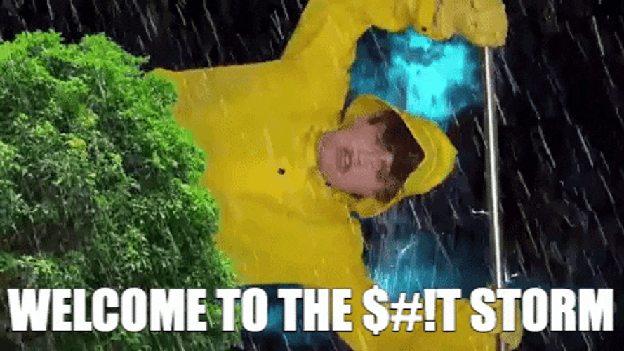 Guy On Raincoat DuringThunderstorm GIF