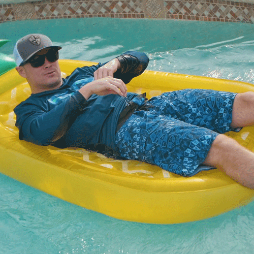 Guy On The Pineapple Floaties GIF