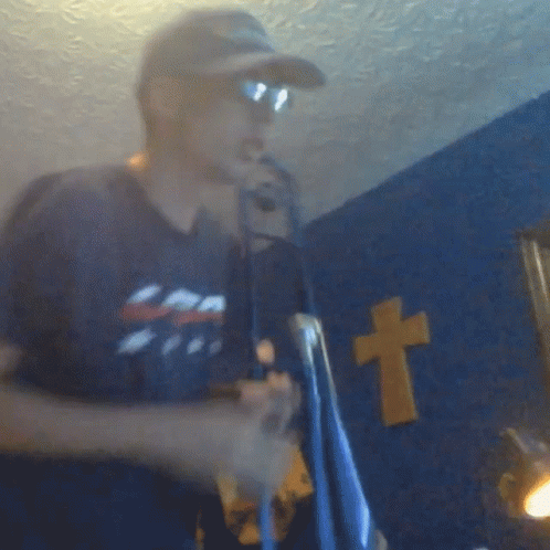 Guy Playing Sad Trombone GIF