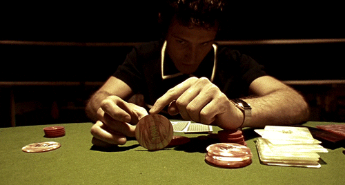 Guy Richie Flipping Poker Coins GIF