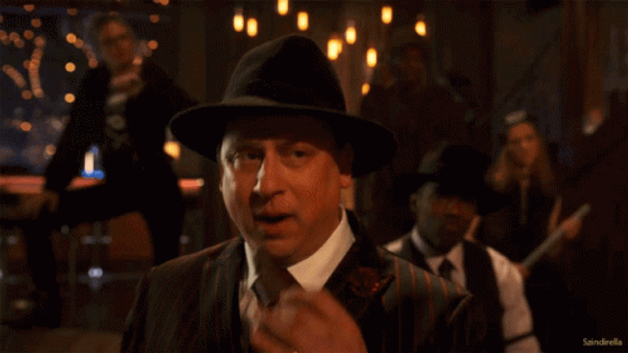 Guy Smoking Cigar And Winked GIF