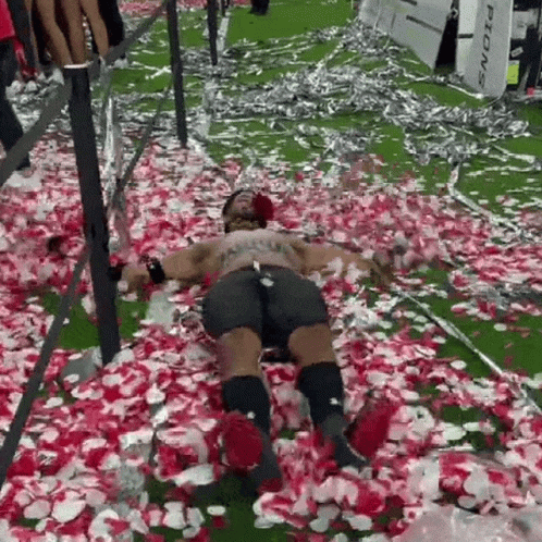 Guy Swimming On The Confetti Cannon GIF