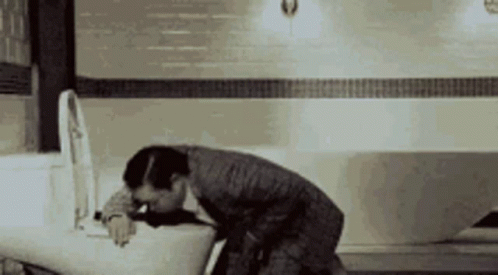 Guy Throwing Up Badly GIF