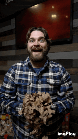 Guy Throws Fall Leaf GIF