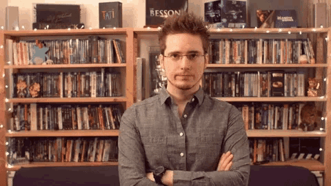 Guy Waiting In The Library GIF
