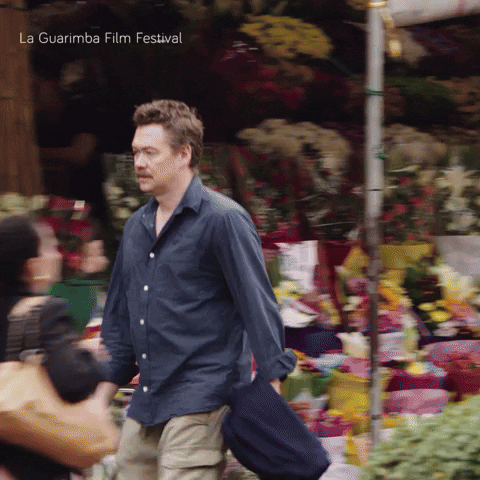 Guy Walking Fast To Explore City GIF