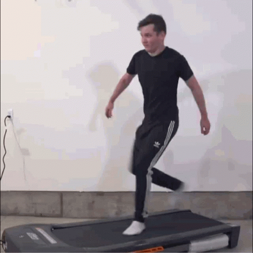 Guy Walking On A Treadmill GIF
