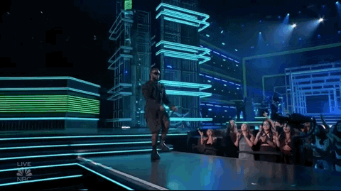 Guy Walking On Stage GIF