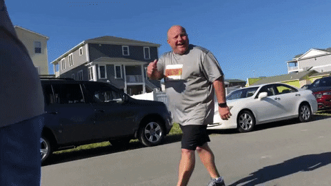 Guy Walking With A Thumbs Up GIF