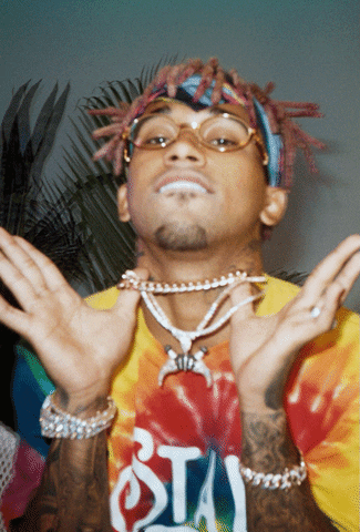 Guy Wearing Costume As Tribal Chief GIF