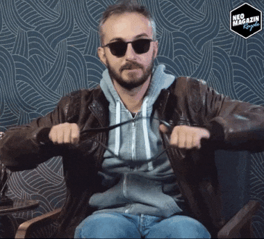 Guy Wearing Dark Shades Yanking Belt GIF