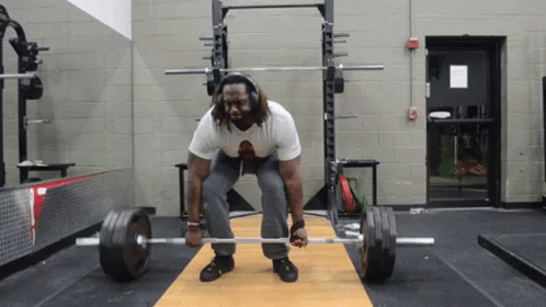Guy Weight Lift Single Leg Deadlift GIF