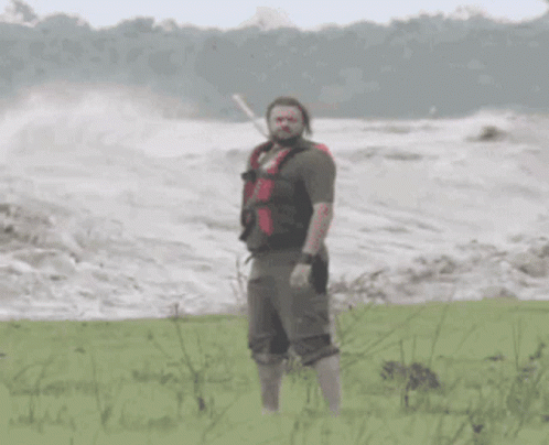 Guy Welcoming Flooded Water GIF