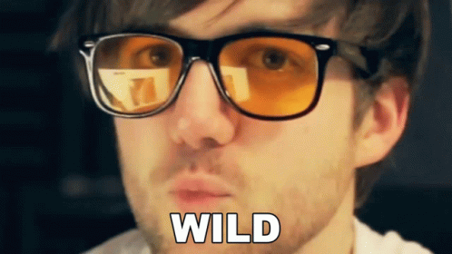Guy With Orange Glasses Saying Wild GIF