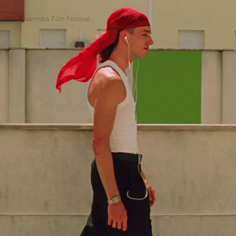 Guy With Red Bandana Walking GIF