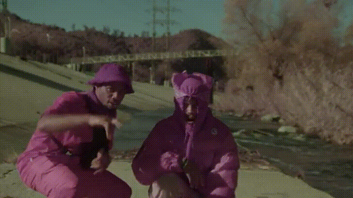 Guys With Purple Costume Pointing GIF