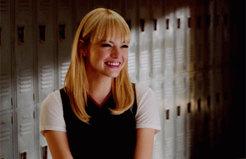 Gwen Stacy Emma Stone Coy Smile GIF