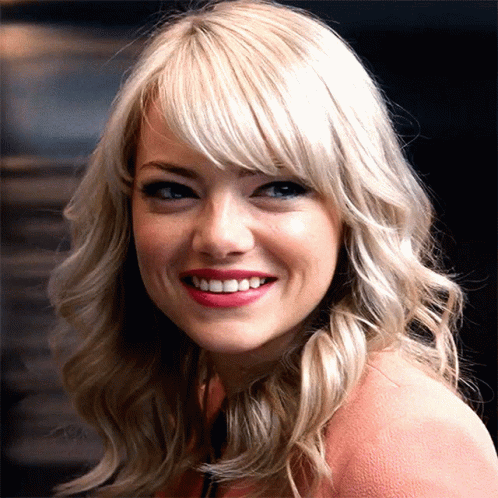 Gwen Stacy Nodding Big Grin Emma Stone GIF