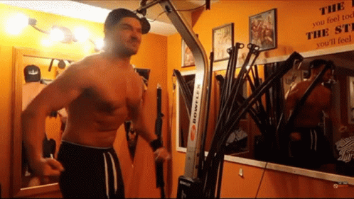 Gym Rat Flexing Muscles GIF