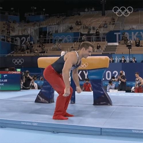 Gymnast Doing Trick on Pommel Horse