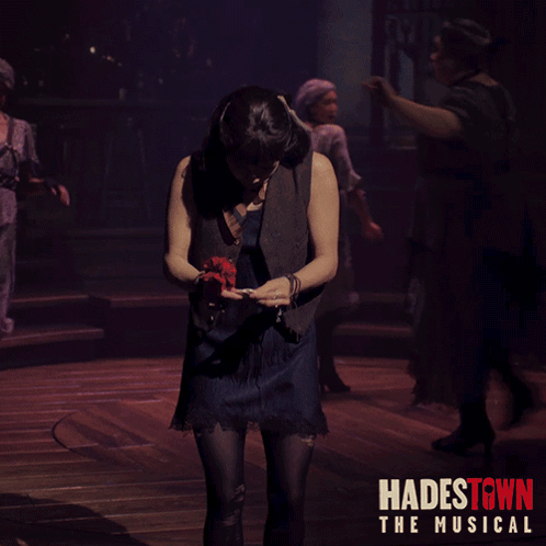 Hadestown Poster Woman Holding Microphone