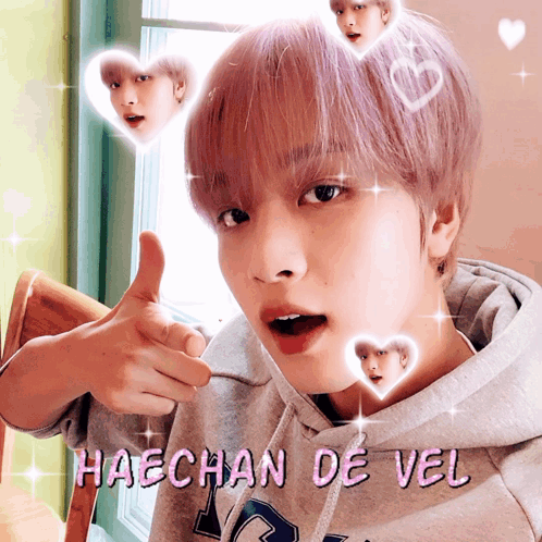 Haechan De Vel Giving A Thumbs Up With Hearts Around Him GIF