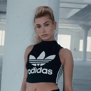 Hailey Bieber Wearing Black Adidas Crop Top GIF