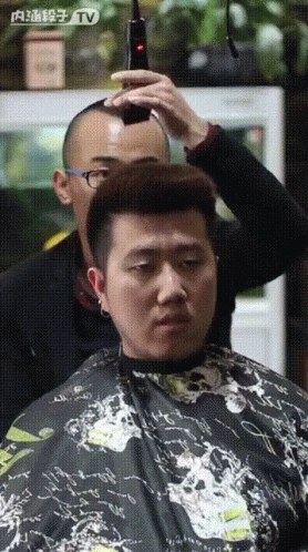 Haircut Using Swinging Shaver GIF