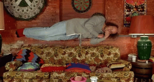 Half Baked Guy On Couch Floating GIF