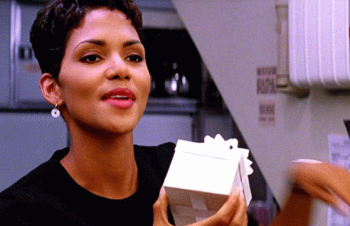 Halle Berry Holding A Gift GIF
