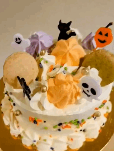 Halloween Cake with Ghosts Skulls and Pumpkins