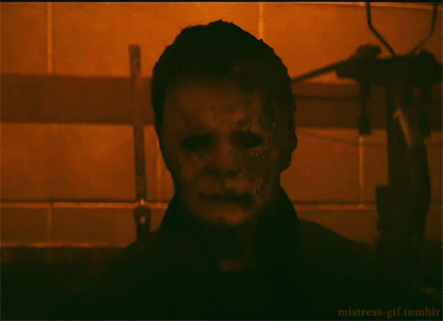 Halloween Kills Michael Myers Creeping In Darkness GIF