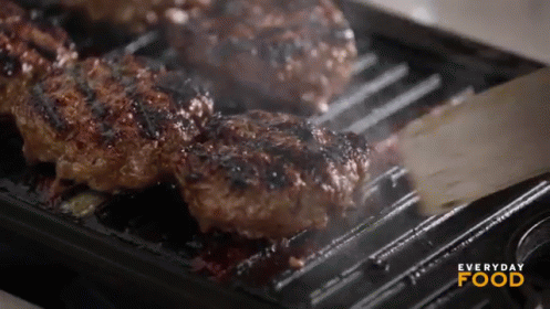 Hamburger Patties Cooking on Grill With Everyday Food