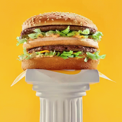 Hamburger Statue on White Column