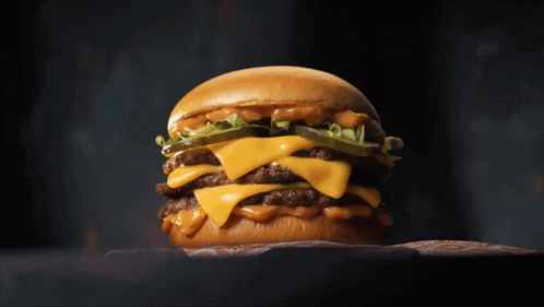 Hamburger with Cheese and Onion Rings