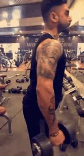 Striving To Do Hammer Curls GIF