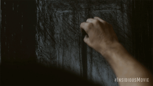 Hand Drawing #insidiousmovie on Black Board