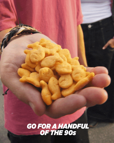 Hand Full Of Fish Crackers GIF