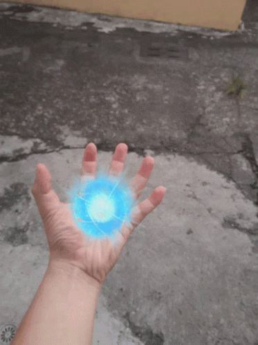 Hand Holding Blue Ball GIF