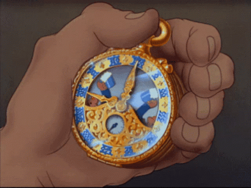 Hand Holding Clock With A