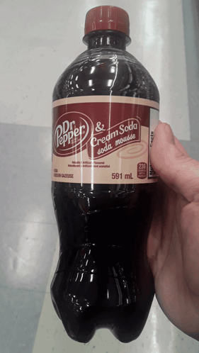 Hand Holding Dr Pepper Bottle GIF
